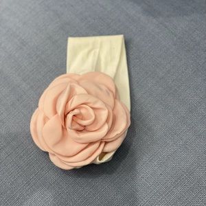 Custom made from Etsy shop. Pale pink baby headband.